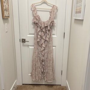 NWT Storia ruffle maxi dress featuring a floral print. 
Floral Ruffle Dress